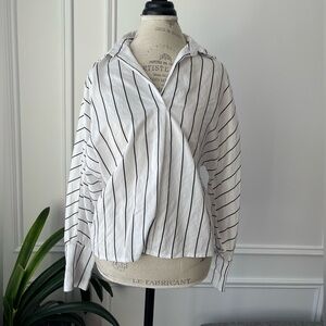 White long sleeve blouse with black vertical stripes